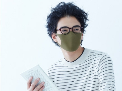 Man wearing a khaki Pitta Mask